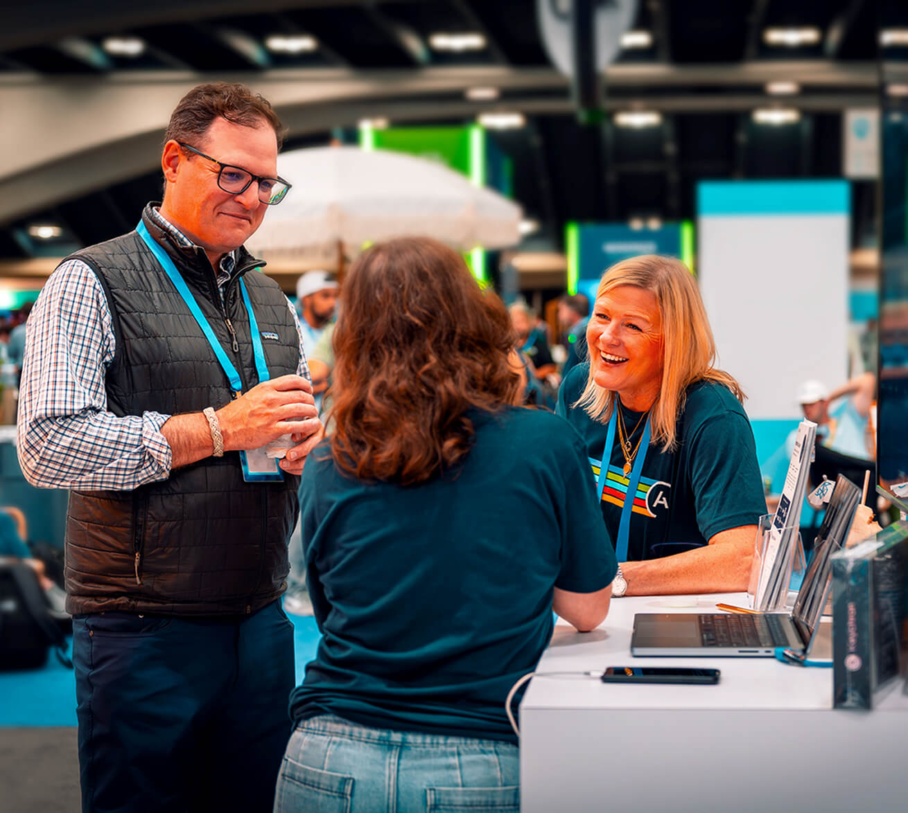 Astronomer team members at their conference booth